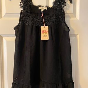 Adorable top bought at local boutique.